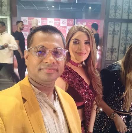 Dr. Shastri with a guest at a public event